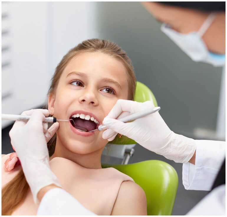 stock image of boy with dentist