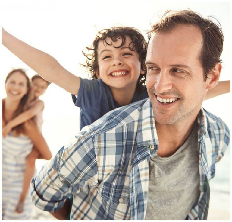 stock image of family smiling
